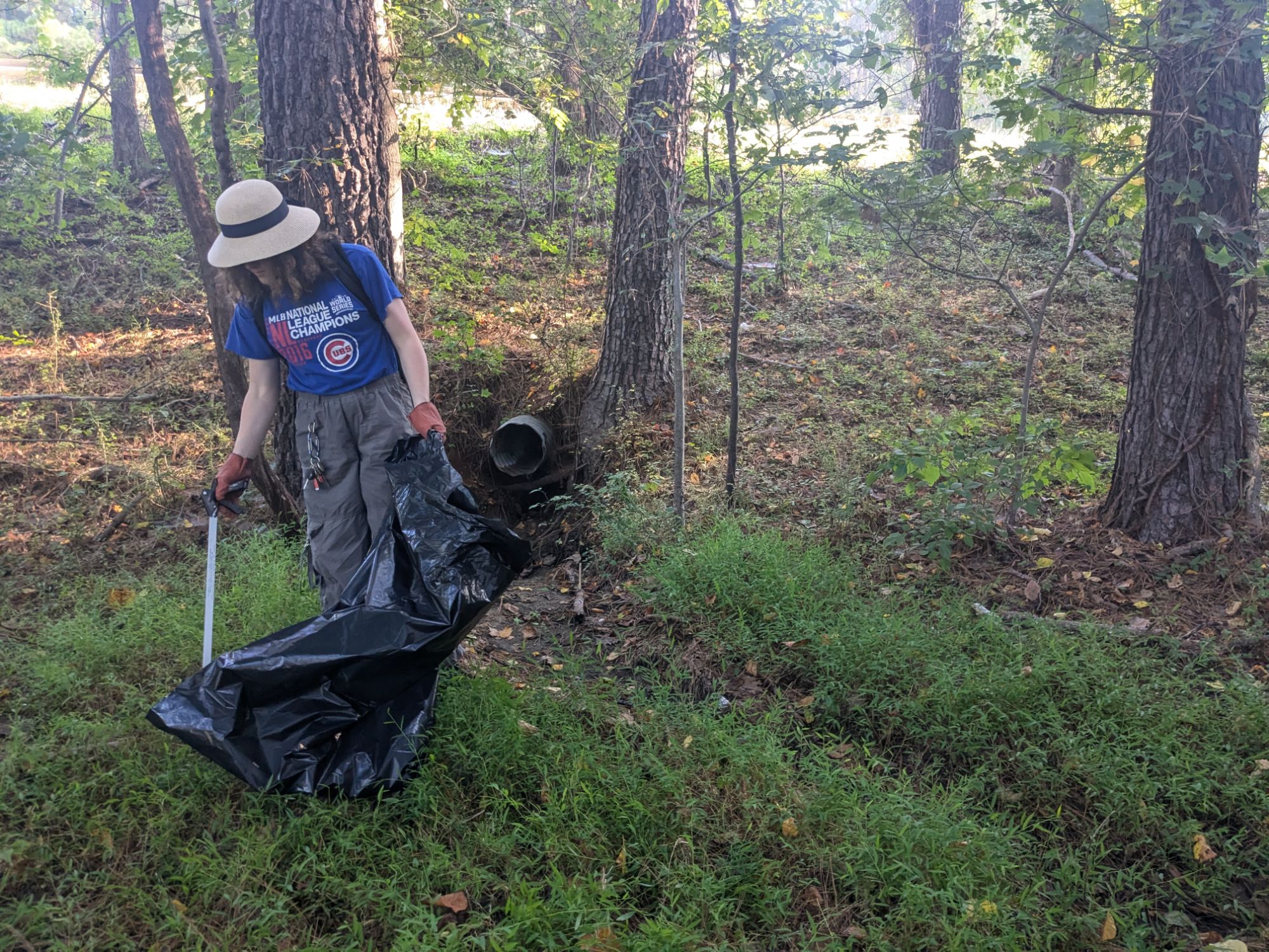 Member of Secular Women of Triangle volunteering at a Big Sweep event