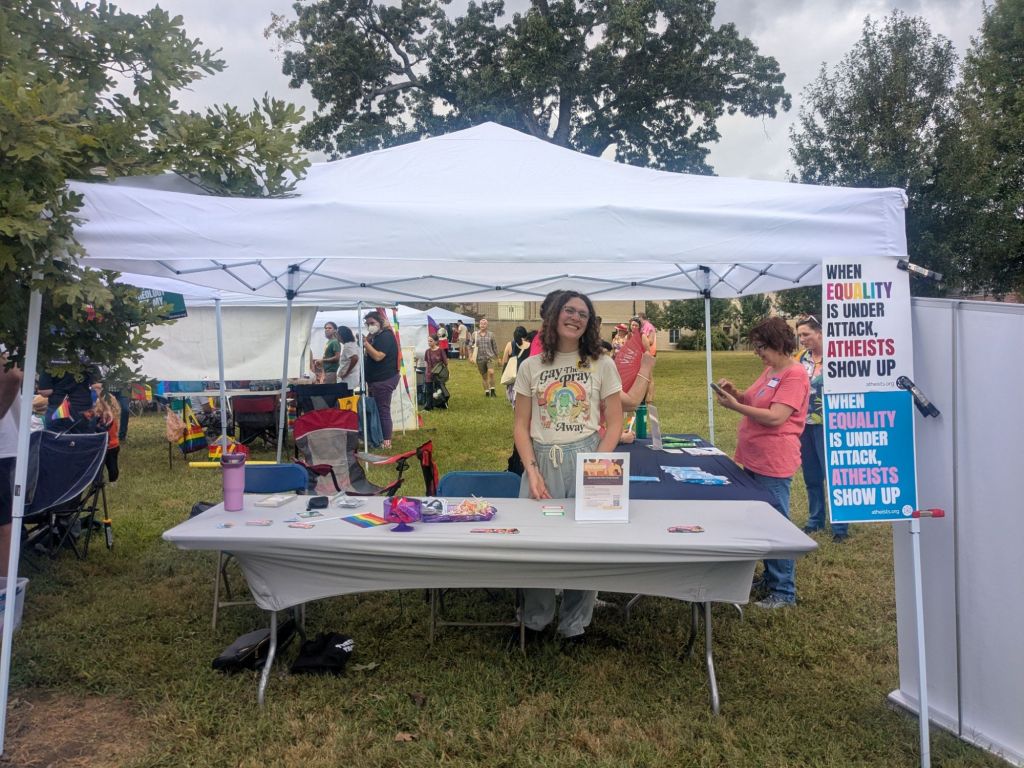 Women at table at Pride festival